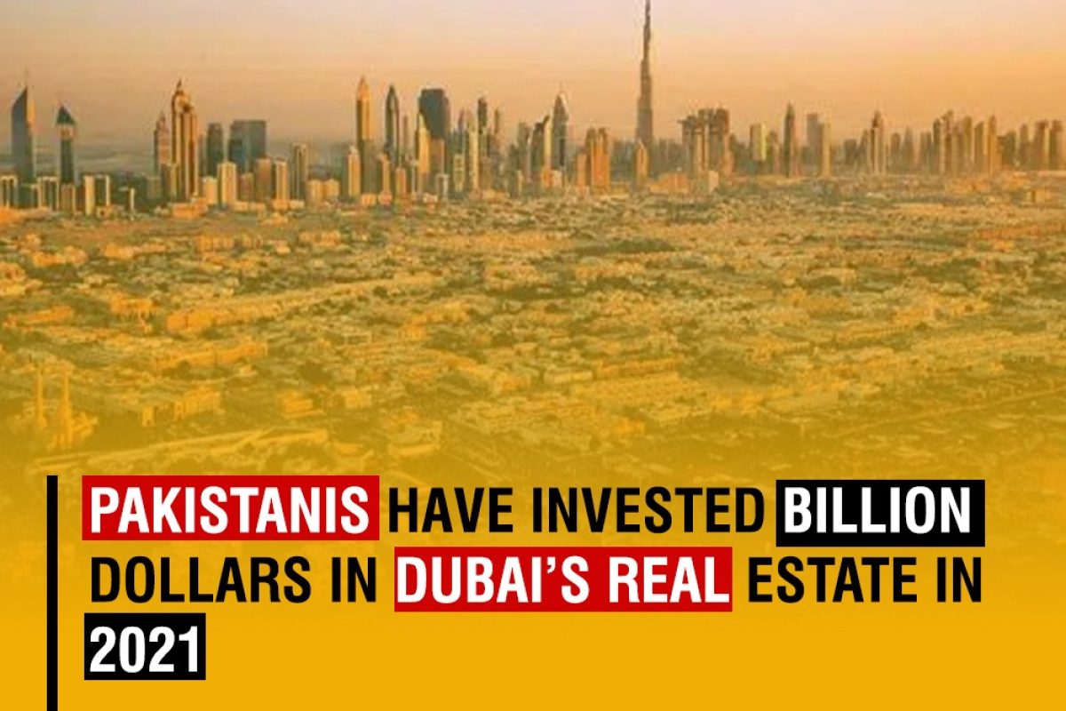 Pakistani flag waving in front of Dubai skyline, symbolizing Pakistani investments in Dubai's real estate market in 2021.